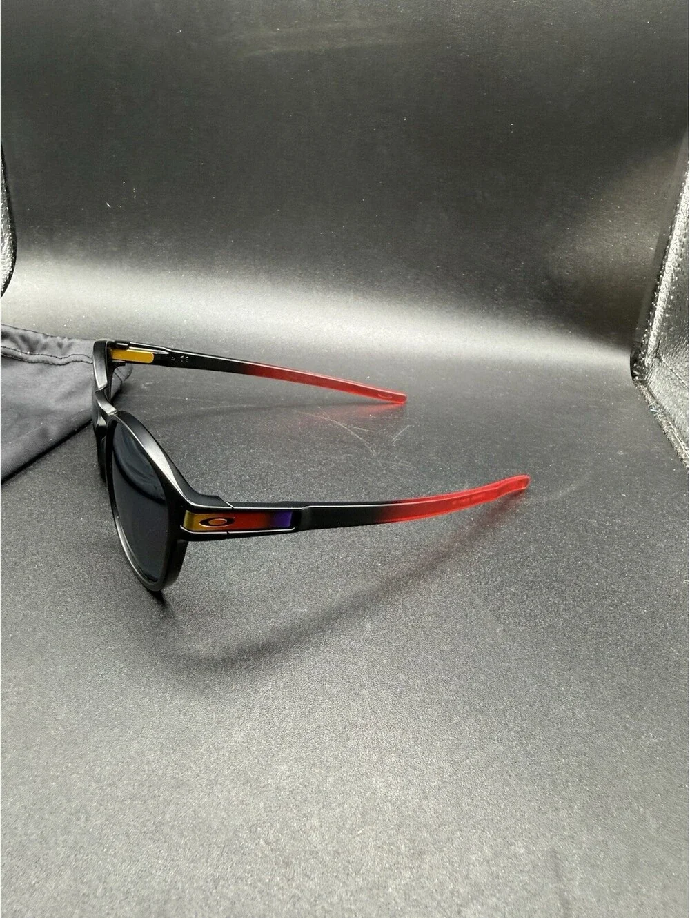 Oakley Latch Ruby Fade/Prizm Black Iridium Polarized Lens OO9265-2653